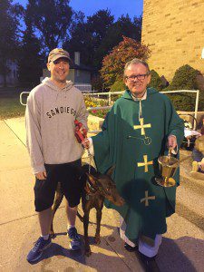 Blessing of the Pets - Fr. Mike with Doberman
