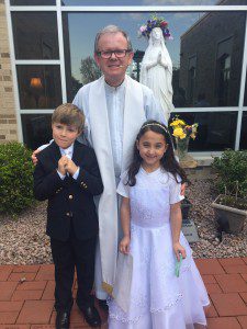 May Crowning 2016 Fr. Mike with Communion children